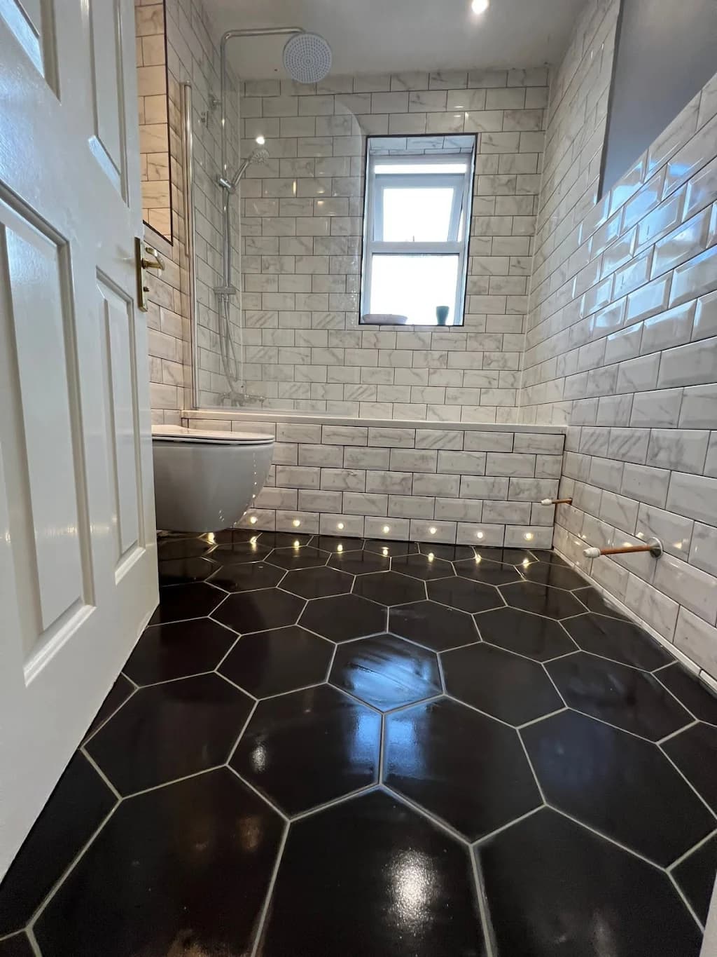 Bespoke bathroom with hexagon floor tiles and LED lighting - Modern bathroom design Streatham