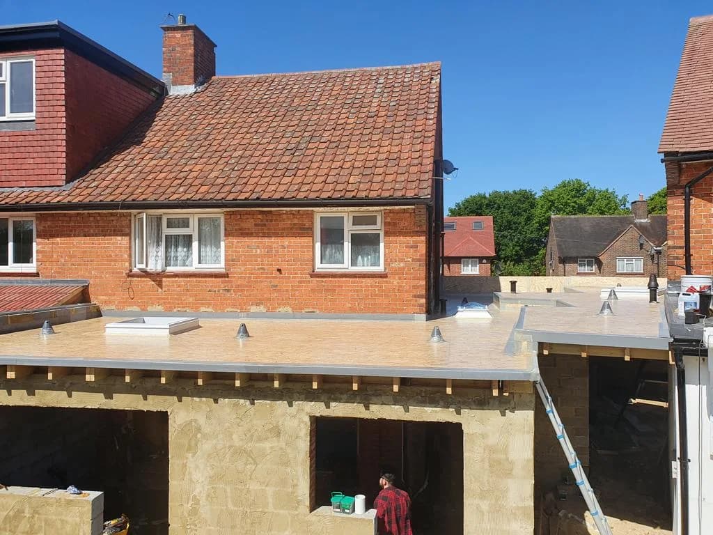 Single story rear extension with flat roof - Home extension specialists Surrey